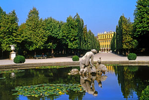 Austria, VIENNA, Schonbrunn Palace and gardens, pond with stone figure, VIE263JPL A 300