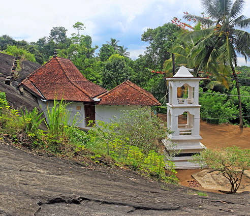 Degaldoruwa Cave Temple, at the base of a huge rock