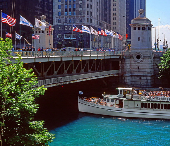 CHICAGO, pleasure boat passing under Michigan Avenue Bridge, US3316JPL 700
