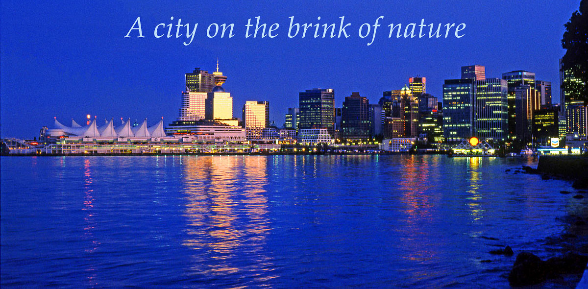 CANADA, British Columbia, VANCOUVER, night skyline and Canada Place (left), CAN563JPL A 1200 with caption