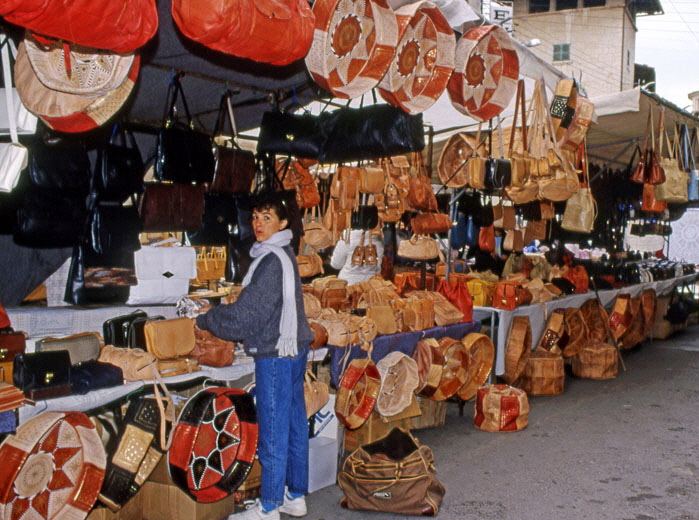 MALLORCA, Inca, market scene, leather goods stall and vendor, MAL1249JPL A 520 deep