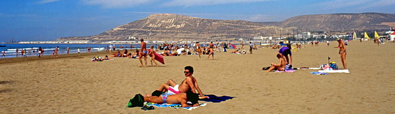 MOROCCO, Agadir, beach and tourists sunbathing, MOR282JPL 6000 A 600