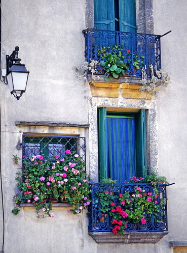 AGDE, old town wrought iron balconies with flowers, FR485JPLA  375 wide