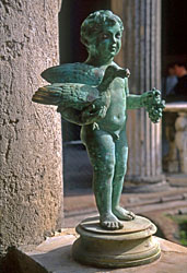 ITALY, Campania, POMPEII, Roman House courtyard, bronze statue of boy, ITL1080JPL  250 deep