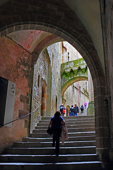 FRANCE, Normandy, MONT SAINT-MICHEL, granite stairways, and visitors, FRA2799JPL A 370