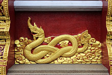 Northern Thailand, CHIANG RAI, Wat Klang Wiang, relief carvings on ubosot, THA4485JPL 200