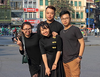 Vietnam, HANOI, Hoan Kiem Lake area, young people posing for photo, VT1720JPL A 400