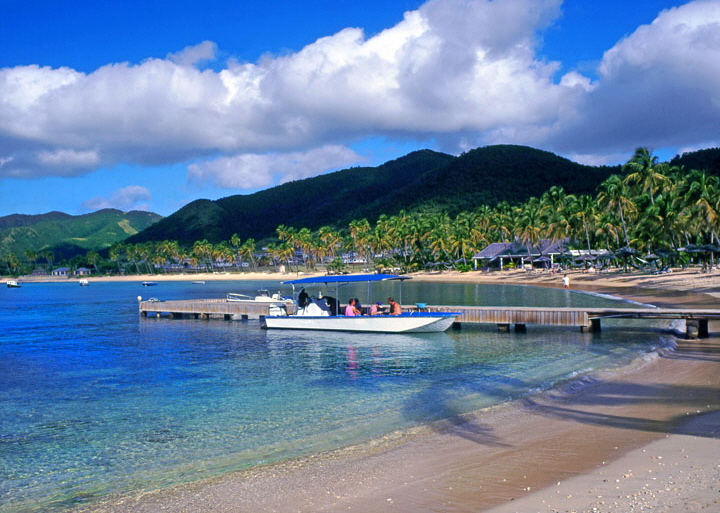 ANTIGUA, Morris Bay, tourists in boat, at pier, view from Curtain Bluff, ANT686JPL A 720