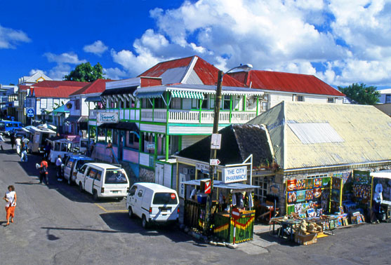 ANTIGUA, St John's, Street scene and 'Hemingways' restaurant (green building), ANT783JPL A 557