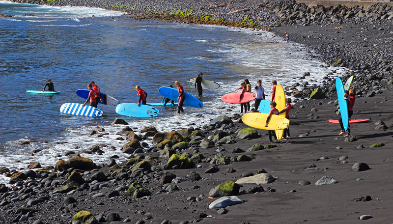 Canary Islands, TENERIFE, Puerto de la Cruz, black (volcanic) sand beach, and surfers, SPN1559JPL 800