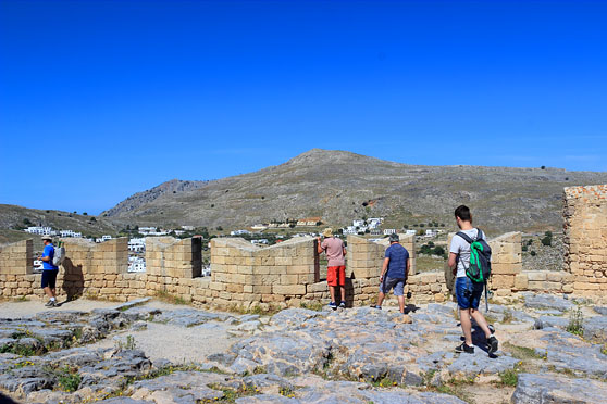 RHODES, Lindos, Acropolis site, tourists walking by the fortifications, GIS1358JPL 558