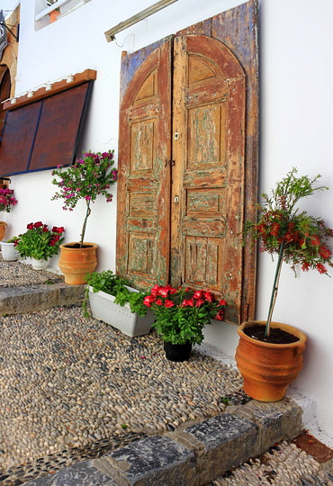 RHODES, Lindos, village street, with house front door and potted plants, GIS1321JPL 370